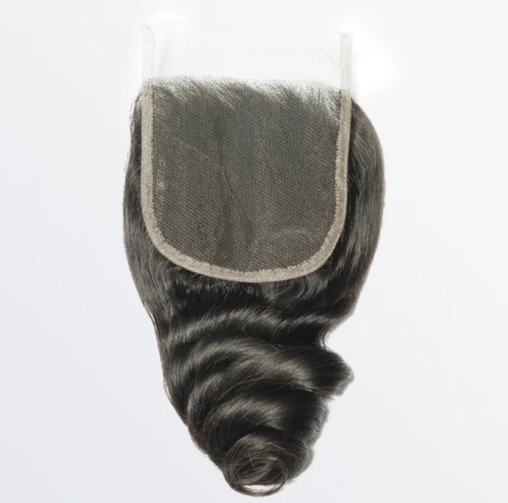 Loose wavy lace closure