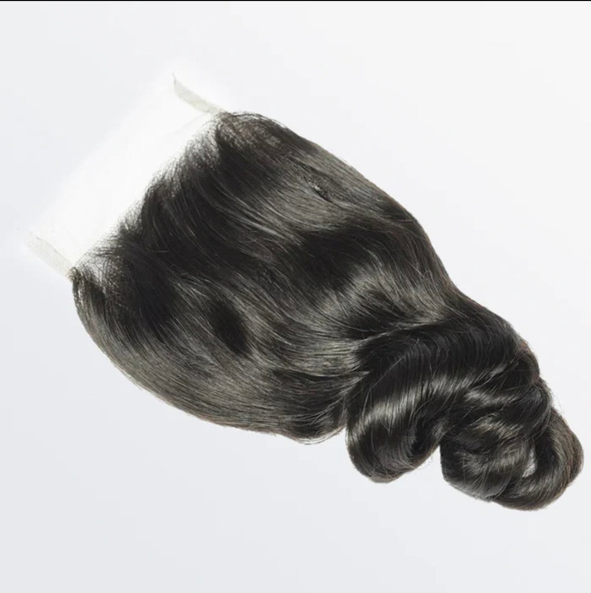 Loose wavy lace closure